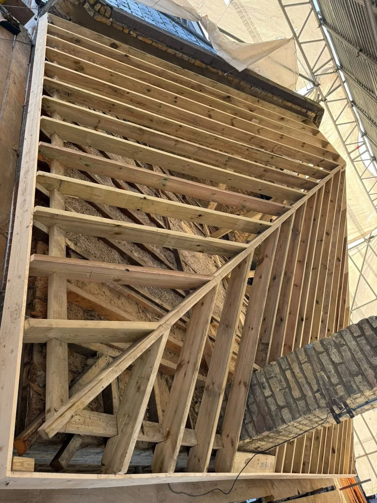New roof timbers and rafters during a re-roof in Truro